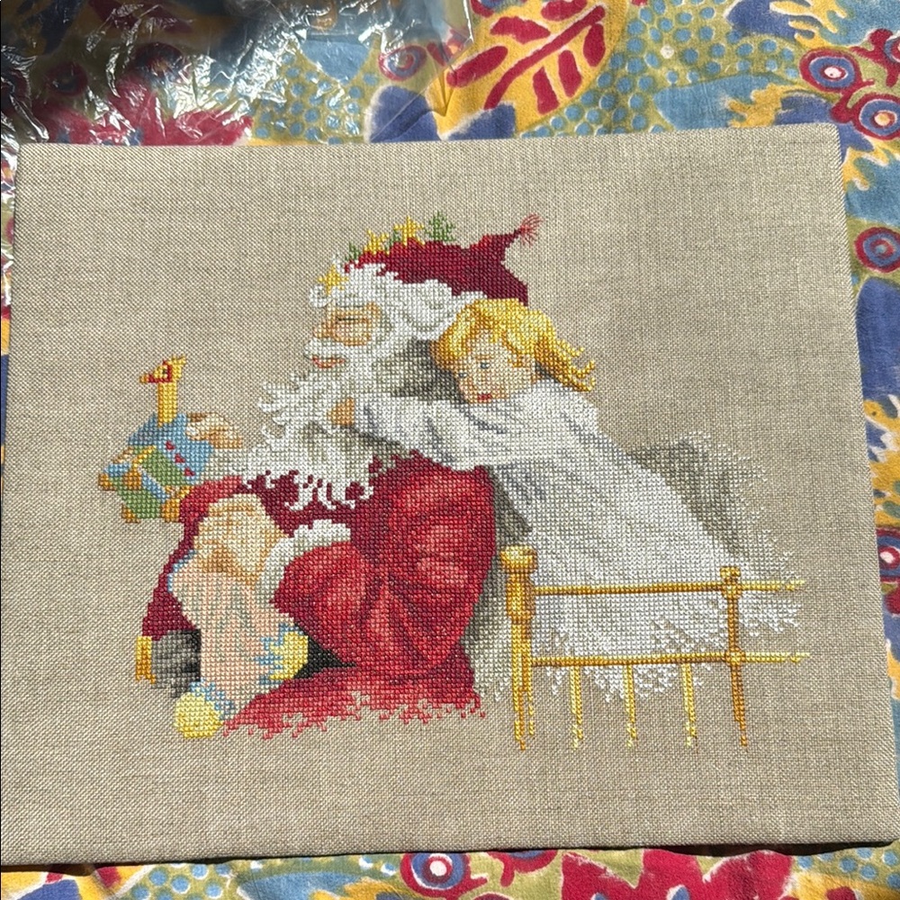 Festive Santa and Child Cross-Stitch Art on Linen